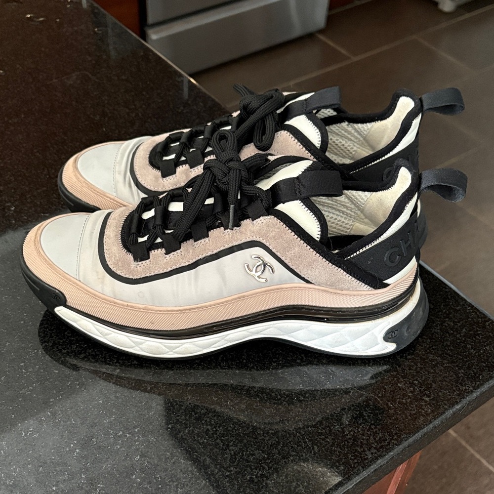 CHANEL Women's Black and Cream Sneakers